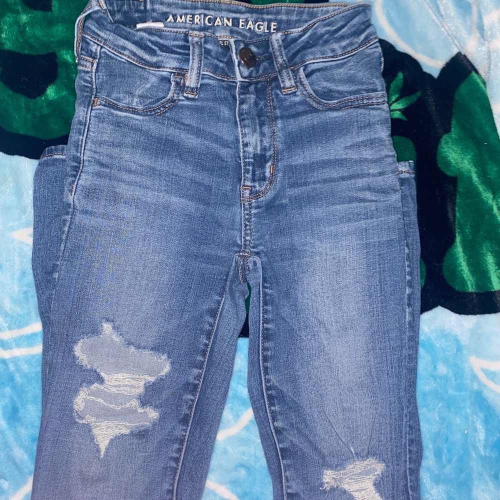 ripped american eagle jeans